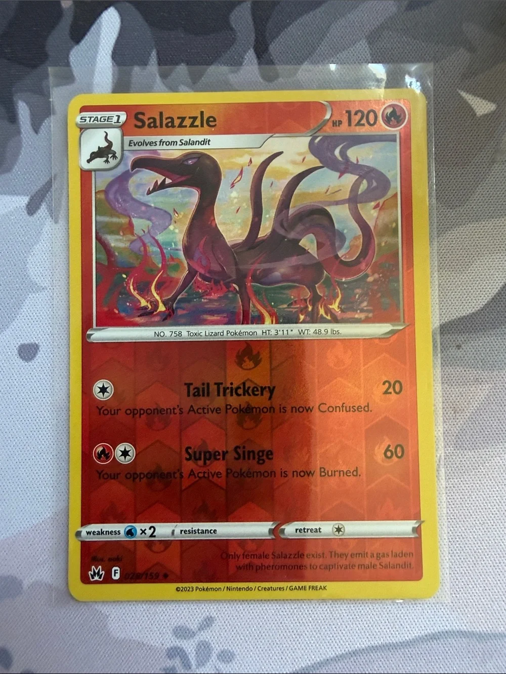 salandit pokemon card - 023/142 - Stellar Crown RarityCommon Hit Points70 HP Fire Ember (30) Discard an Energy from this Pokemon. 2021 Pokemon Sword & Shield